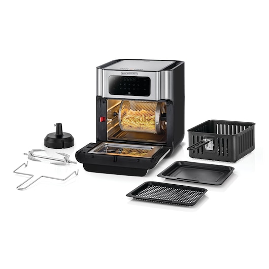 BLACK+DECKER multifunctional air fryer oven with digital control panel, open door displaying a rotisserie basket with fries inside. Included accessories are laid out: rotisserie spit, basket, trays, and other attachments.