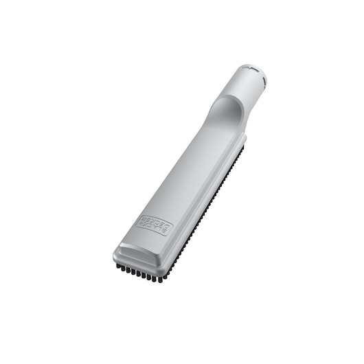 A BLACK+DECKER vacuum cleaner attachment, light grey in color, with a long rectangular narrow design. The attachment has a row of small bristles at the end, used for cleaning tight spaces.