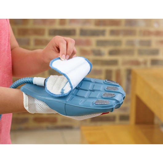 BLACKDECKER FSH10SM steam cleaning glove with blue plastic body and removable white cleaning pad.