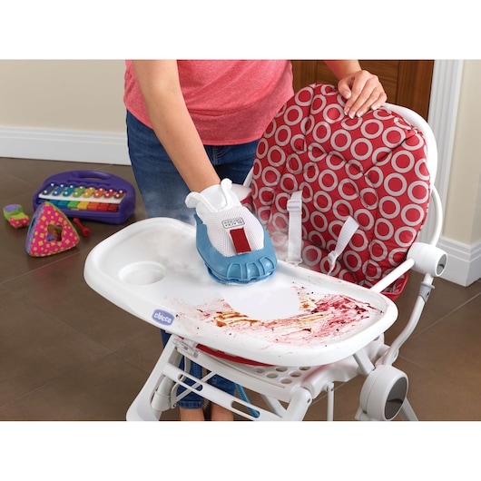 BLACKDECKER FSMH13151SM steam cleaning glove used on high chair tray with red circle pattern seat.