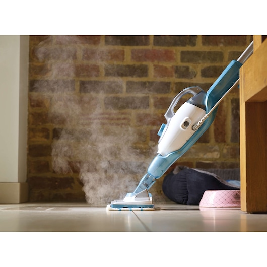 BLACK+DECKER FSMH13151SM steam mop cleaning tile floor, white and blue design, side angle.