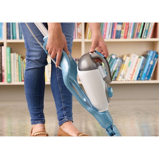BLACKDECKER FSMH13151SM steam mop with detachable handheld unit, blue and white, in use indoors.