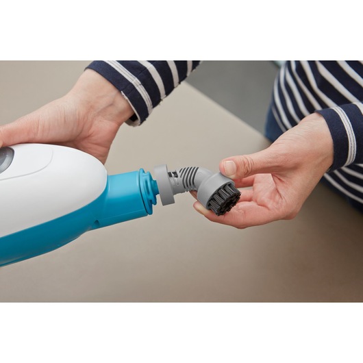 BLACKDECKER FSMH13E10 steam cleaner nozzle and brush attachment shown in close-up photography.