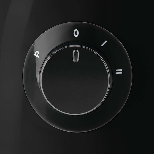 BLACKDECKER FX400 photography of a black control dial with P, 0, I, and II settings, top view.
