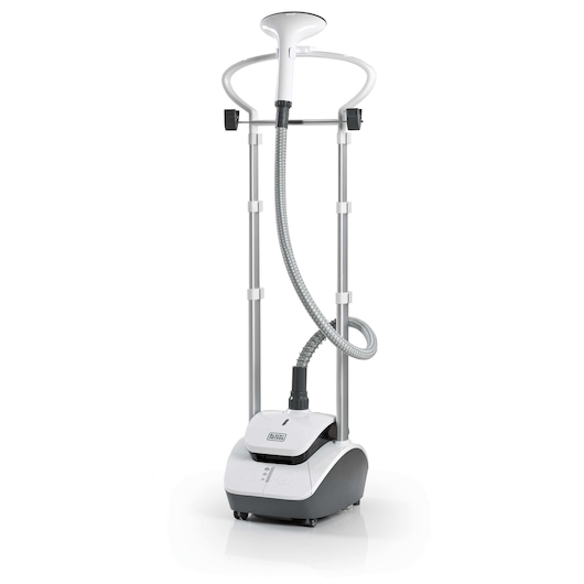 A BLACK+DECKER garment steamer model GST2000, shown upright with a hose, two vertical poles, and a hanger. The base features controls and the BLACK+DECKER logo. The device is designed for steaming clothes.