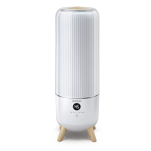 A BLACK+DECKER branded humidifier with a modern cylindrical design, white body, wooden legs, and a digital display on the front.