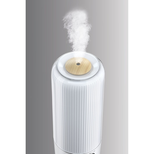 BLACKDECKER HM6000 humidifier with white ribbed body and wood accent, front angle, steam visible.
