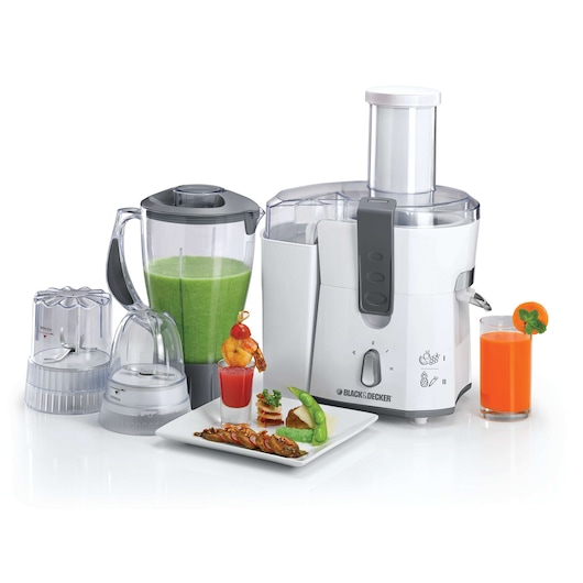 A BLACK+DECKER kitchen appliance set including a juicer, blender, and two smaller attachments. The blender jar contains a green smoothie. There are two glasses of juice and a plate of assorted food in front of the appliances. The appliances are white and gray, arranged on a white surface.