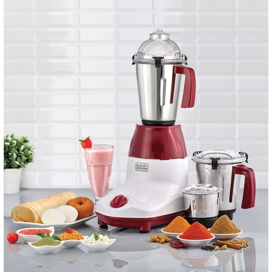 Photo of BLACK+DECKER MG750 mixer grinder with three stainless steel jars, red and white base, on kitchen counter.