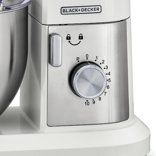 BLACK+DECKER MKM100 stand mixer control panel, close-up with speed dial, silver and white, left side view.