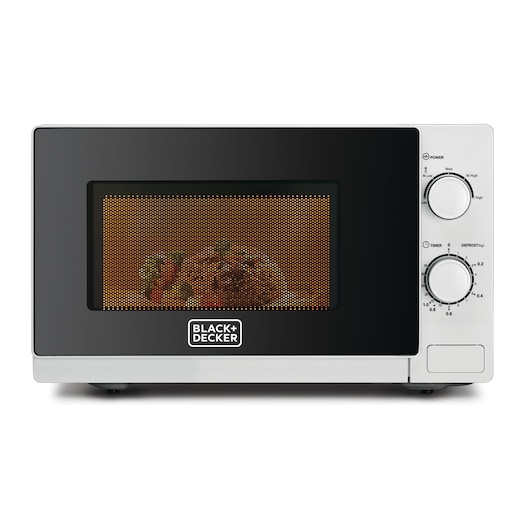 A BLACK+DECKER microwave oven, model MZ2020P, with a black front and silver control panel featuring two dials for power and timer settings. The microwave is turned on with food visible inside through the mesh window.