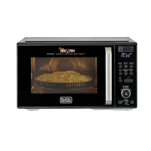 A BLACK+DECKER air fry microwave oven with digital control panel and front handle, showing food cooking inside through the mesh window.