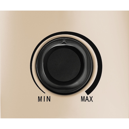 BLACKDECKER OR011FD control knob close-up showing min to max settings on beige surface.
