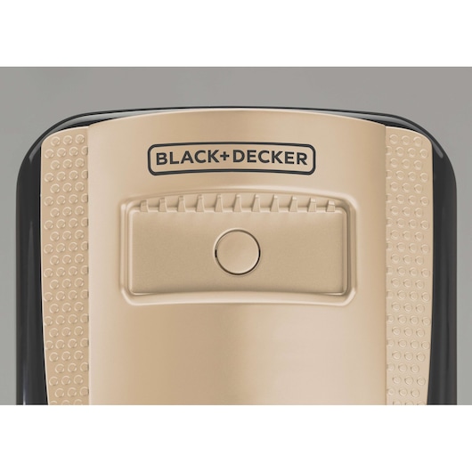 BLACK+DECKER OR013FD photography of beige appliance control panel with textured sides, front angle.