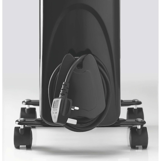 BLACKDECKER OR090D radiator close-up, black power cord wrapped around holder, visible wheels, white background.