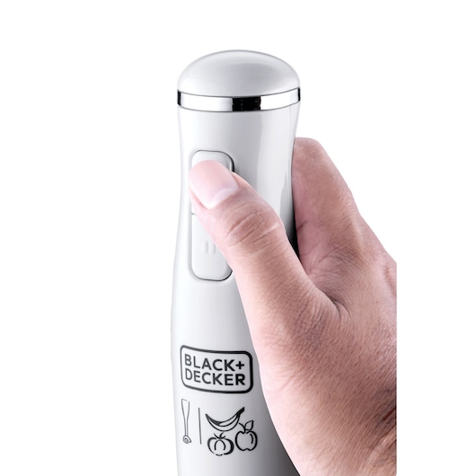 Photo of a hand holding a BLACK+DECKER SB2500 white hand blender, close-up showing power button and logo.