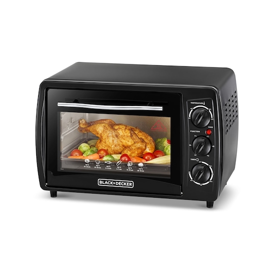A BLACK+DECKER countertop oven with a transparent door showing a roasted chicken and vegetables inside. The oven has three control knobs on the right side for temperature, function, and timer settings.