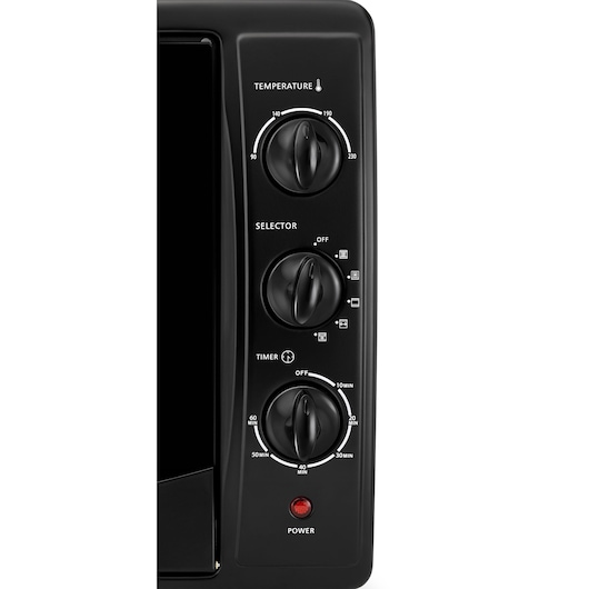 Photo of BLACKDECKER TRO45RDG oven control panel with three black dials for temperature, function, and timer settings, front angle.