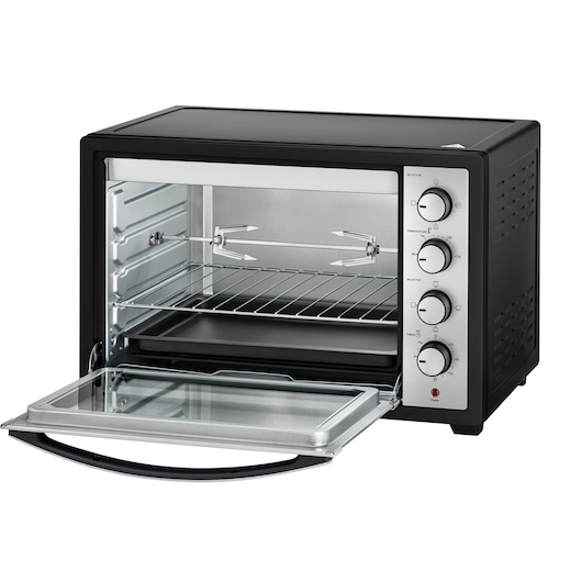 A black and silver countertop electric oven with an open glass door, showing metal racks and rotisserie attachments inside. The oven has four control knobs on the right side for settings.