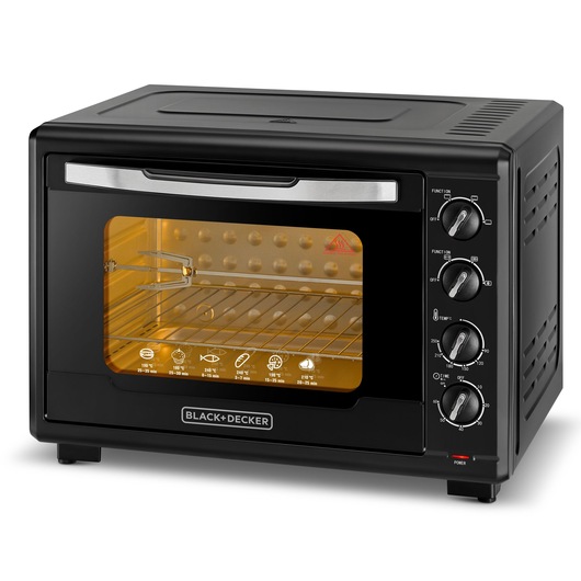 A BLACK+DECKER countertop electric oven with a glass door, four control knobs on the right side, and a wire rack inside. The oven displays cooking icons and instructions for different foods on the lower part of the door.