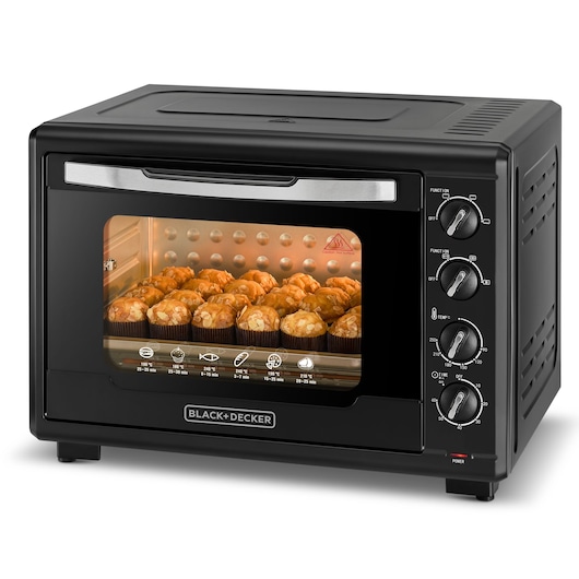 Photo of BLACK+DECKER TRO55RDG black countertop oven with control knobs, front angle, baking muffins inside.