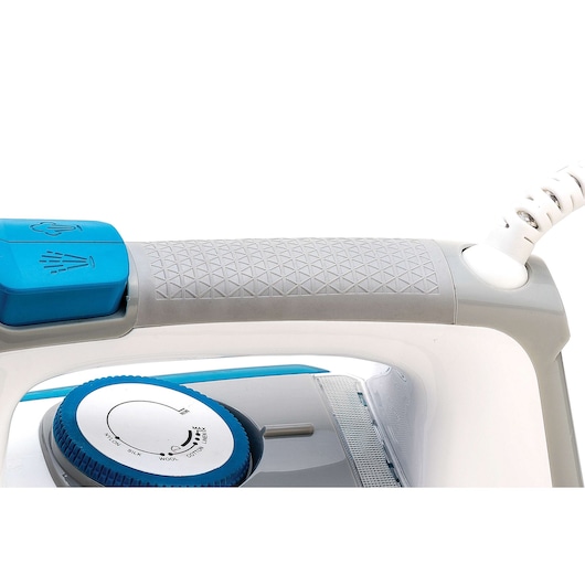 BLACKDECKER X2800 steam iron close-up, showing textured gray handle, blue steam button, and control dial, side angle.